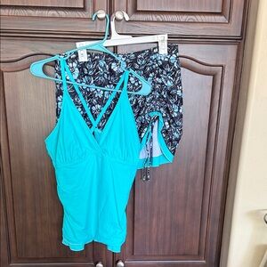 Women's Turquoise Swim Top and floral bottoms.